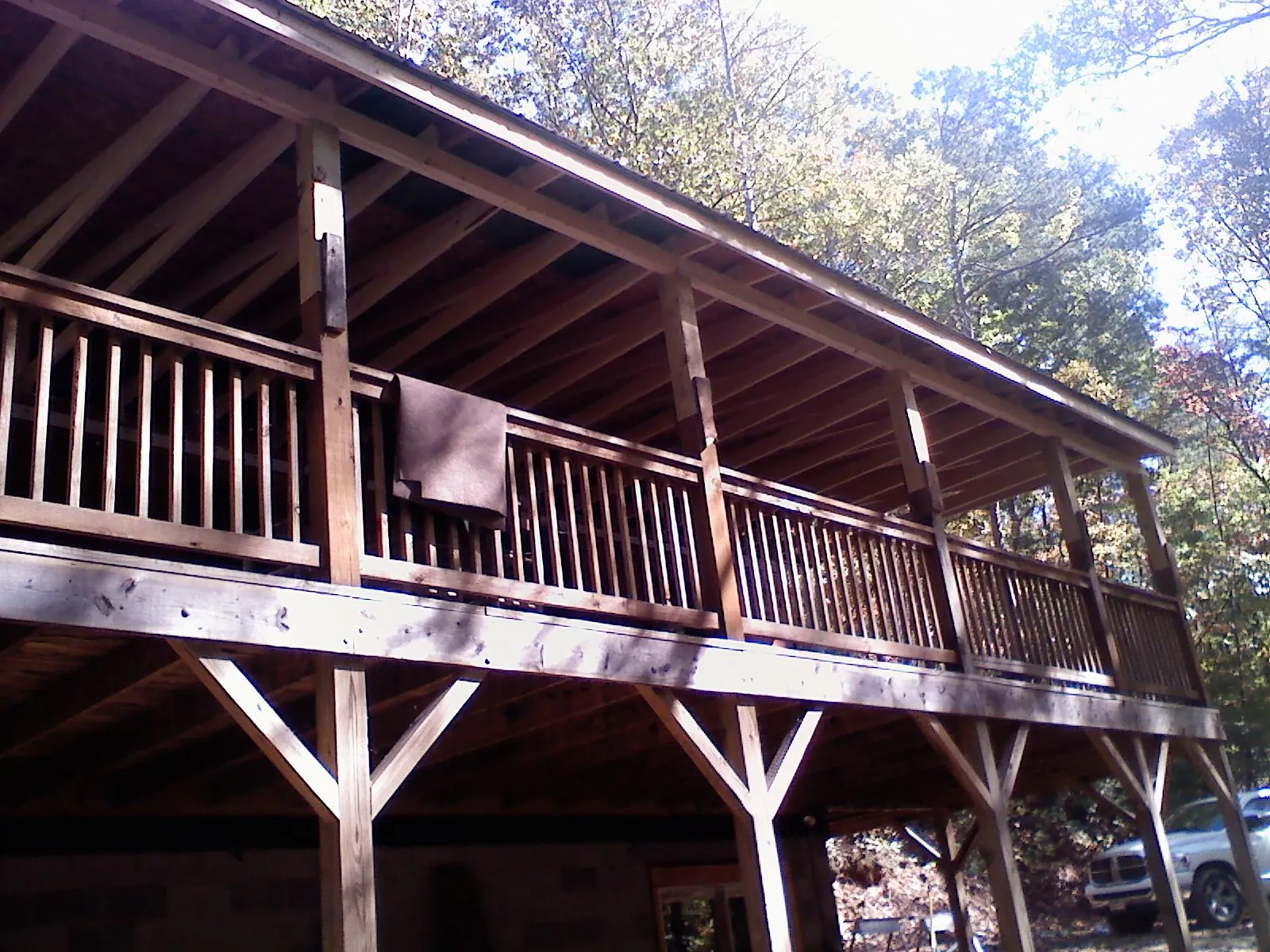 Timber framing under a new elevated porch and deck — Roof Leak Repair in Northpoint by Roofing Brothers
